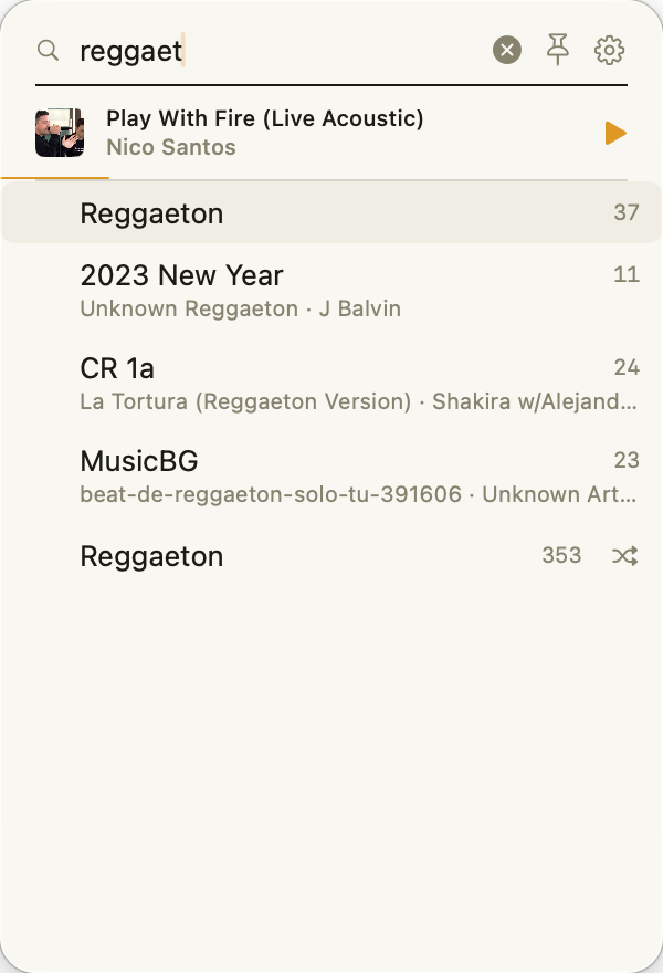 Search results showing matching playlists, songs, and genres